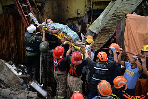 Rescuers Save Man's Life Amid Collapsed Buildings .